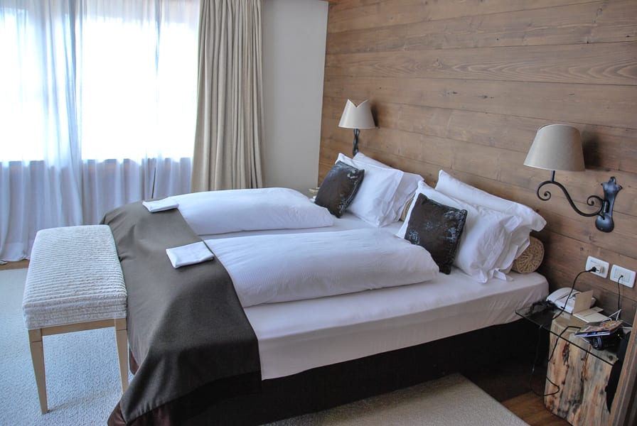 Cozy bedroom at Hotel Rosa Alpine San Cassiano Dolomites Italy