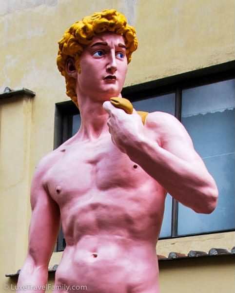 Modernist replica of Michelangelo's David in pink is located in the courtyard of the Galleria dell'Accademia in Florence