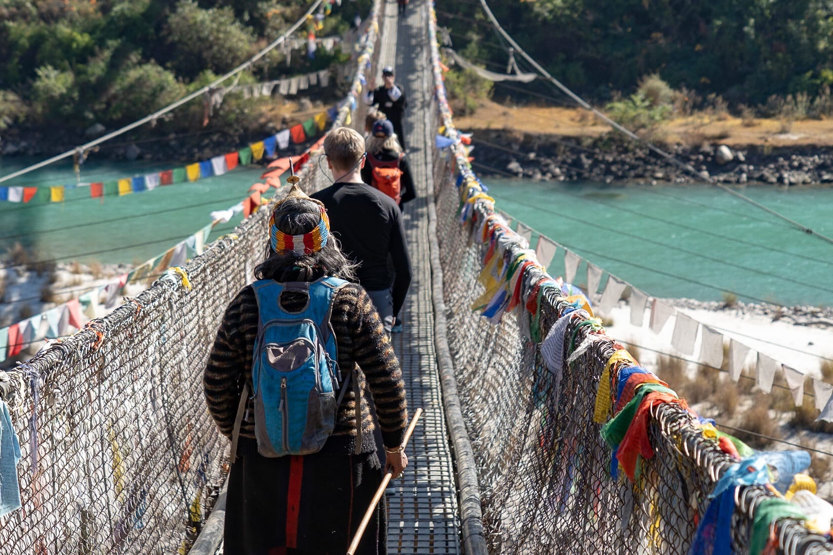 cross a long suspension bridge Punakha things to do in Bhutan with kids